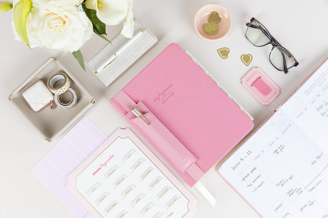 flat lay of new pink planner